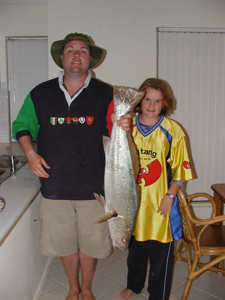 Alan in the mid-2000s after moving to Australia, holding a large fish