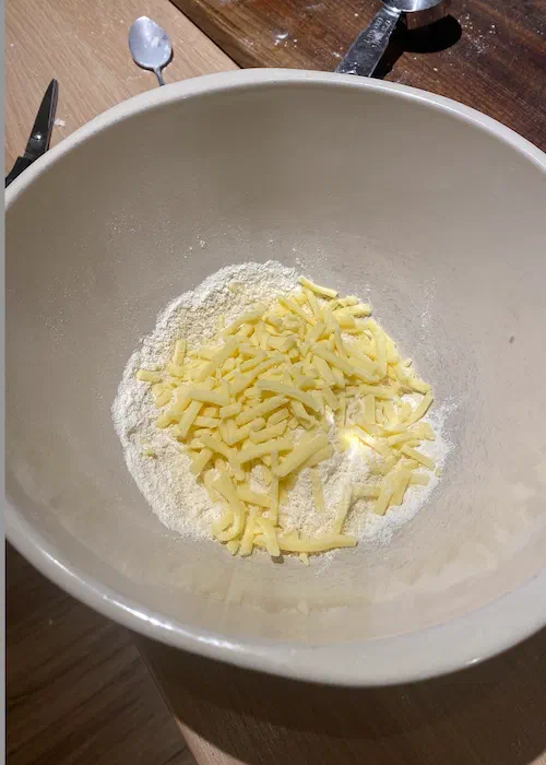 Coconut flour, cheese and xanthan gum in a mixing bowl